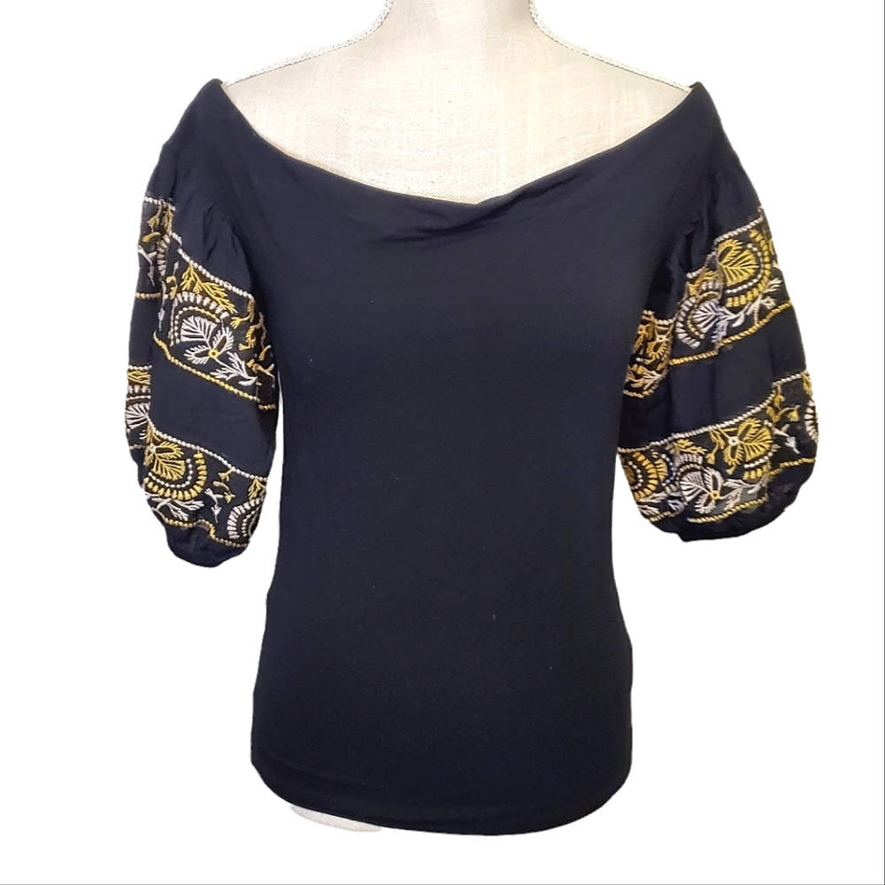 FREE PEOPLE | Women's black with floral embroidered puff sleeve top. Size small.